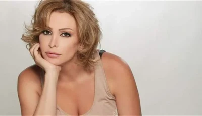 أمل حجازي تظهر بشعر “كيرلي” في أول إطلالة لها بعد خلع الحجاب